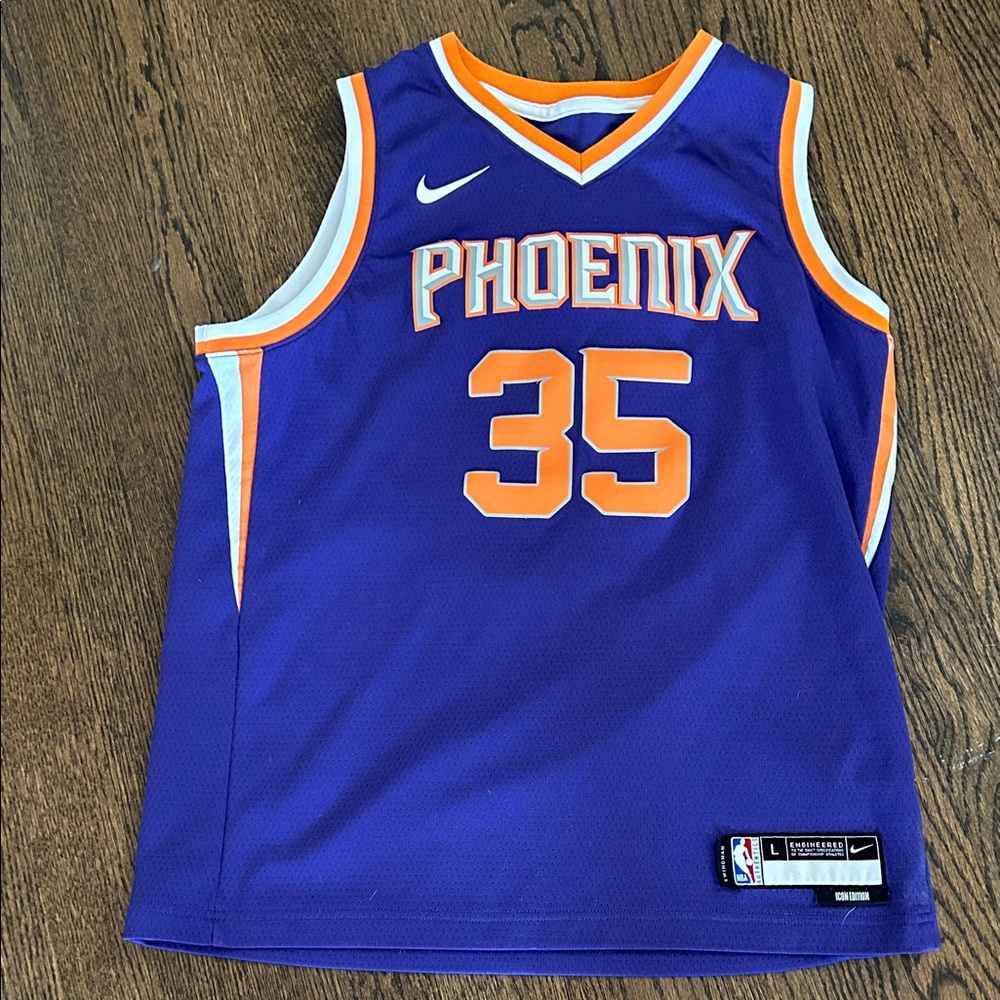 Nike Kids Phoenix Basketball Jersey in Purple with Orange and White Trim #35